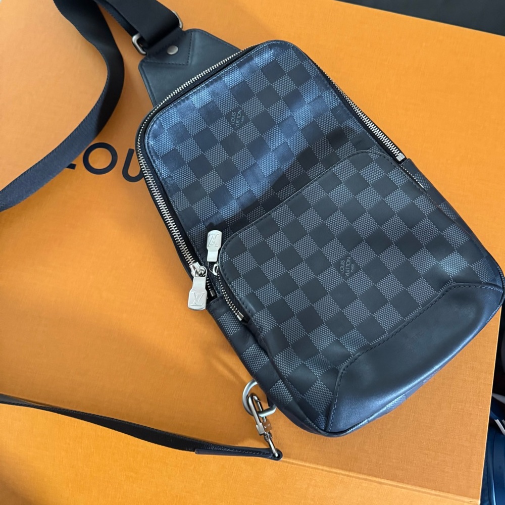 Louis Vuitton Black Belt Bag with Sleek Design